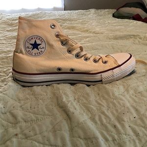 Beige high top converse